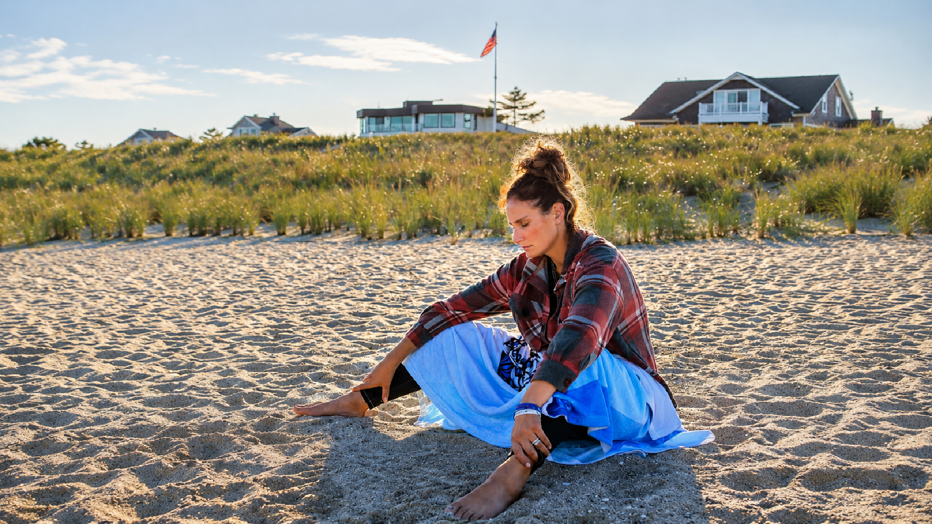 Cathy reflects peacefully on the beach while building mental resilience through Bearcat Coaching guidance and personal growth daily.