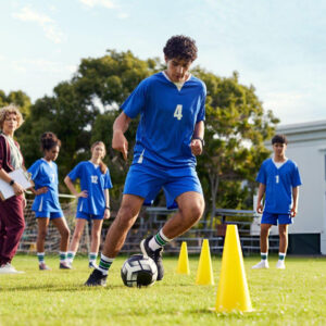 Young athletes practice soccer drills together while improving confidence through Bearcat Coaching mindset training and teamwork every day.