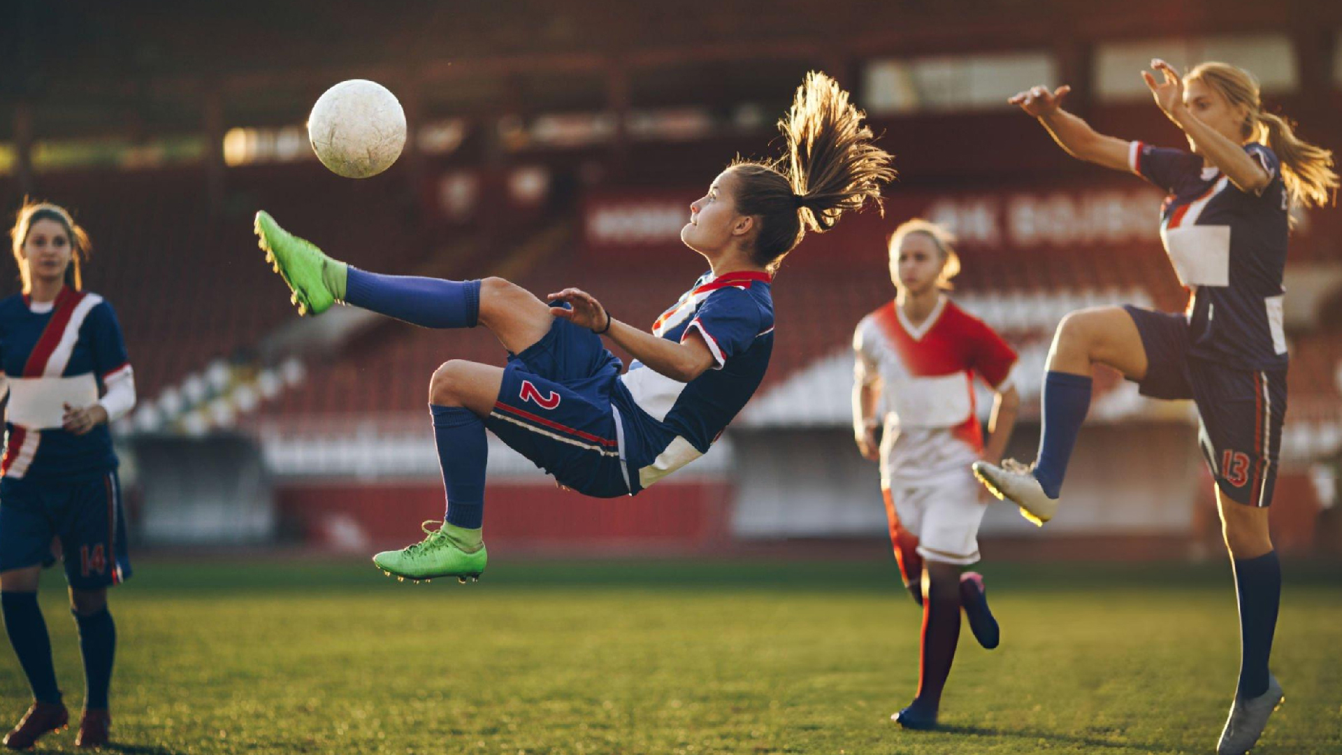 Football athlete demonstrates determination during competition while applying Bearcat Coaching mental performance strategies for success on field.